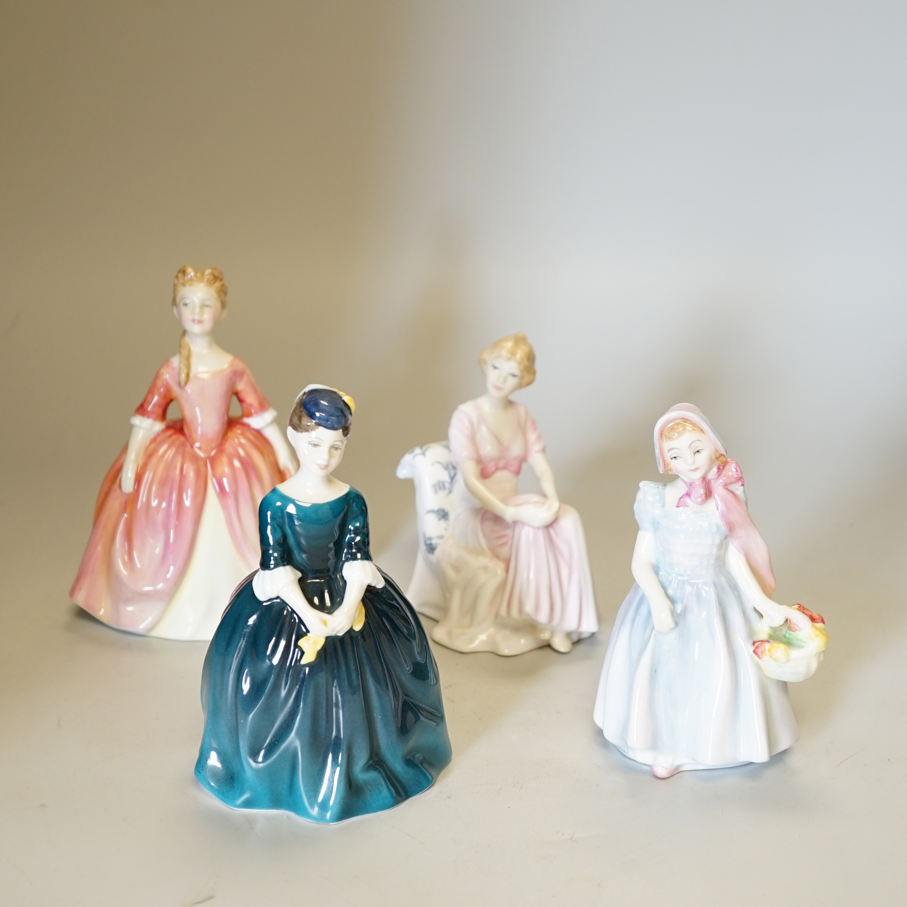 A quantity of various Doulton figures etc